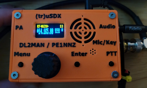 Orange (tr)uSDX powered on, connected to antenna and headphones